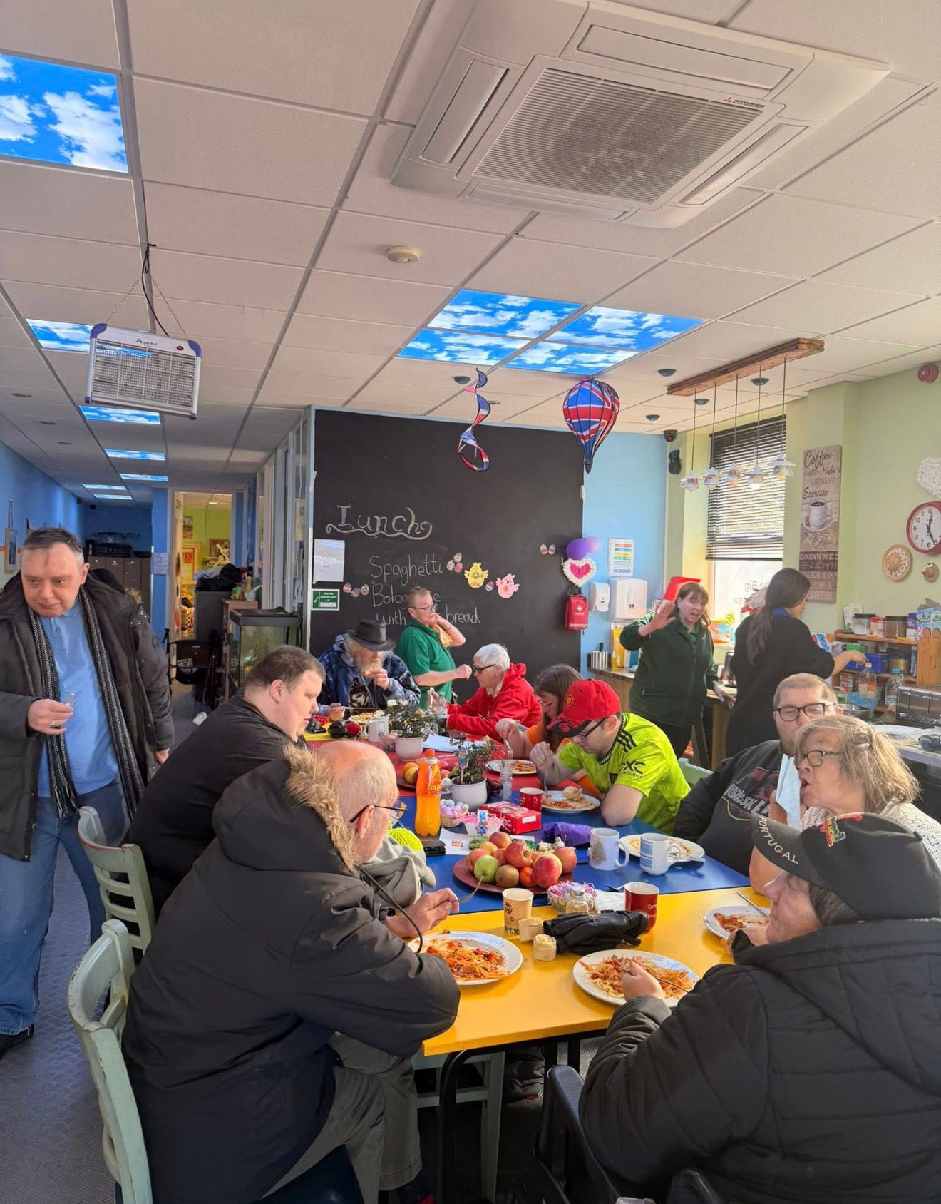People sharing lunch together at The Big Communitea Centre