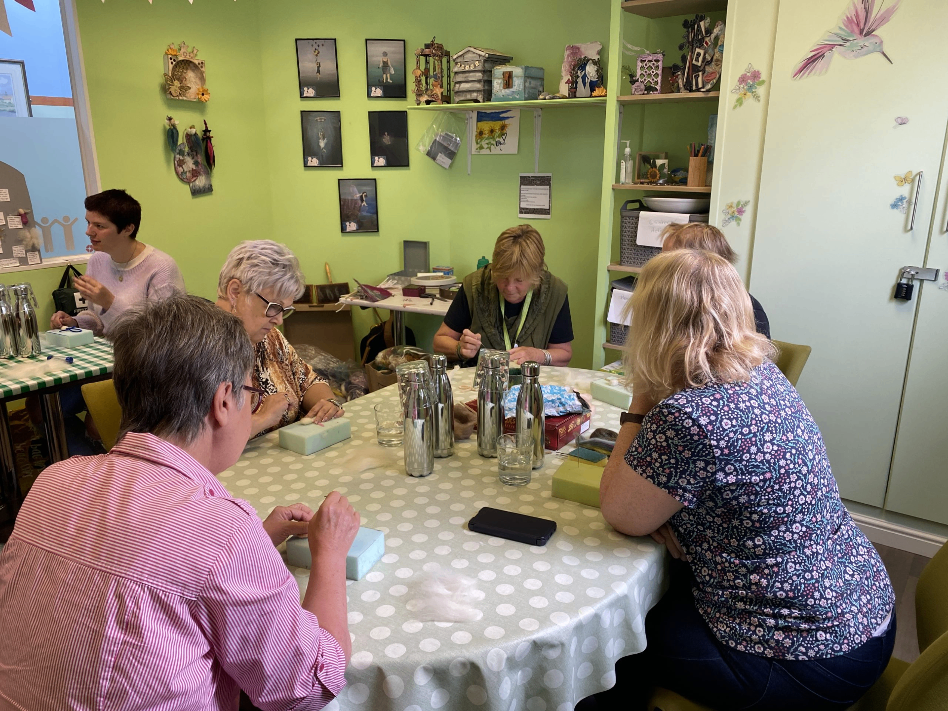 Friends gathered round a table at The Big Communitea Centre in Selby